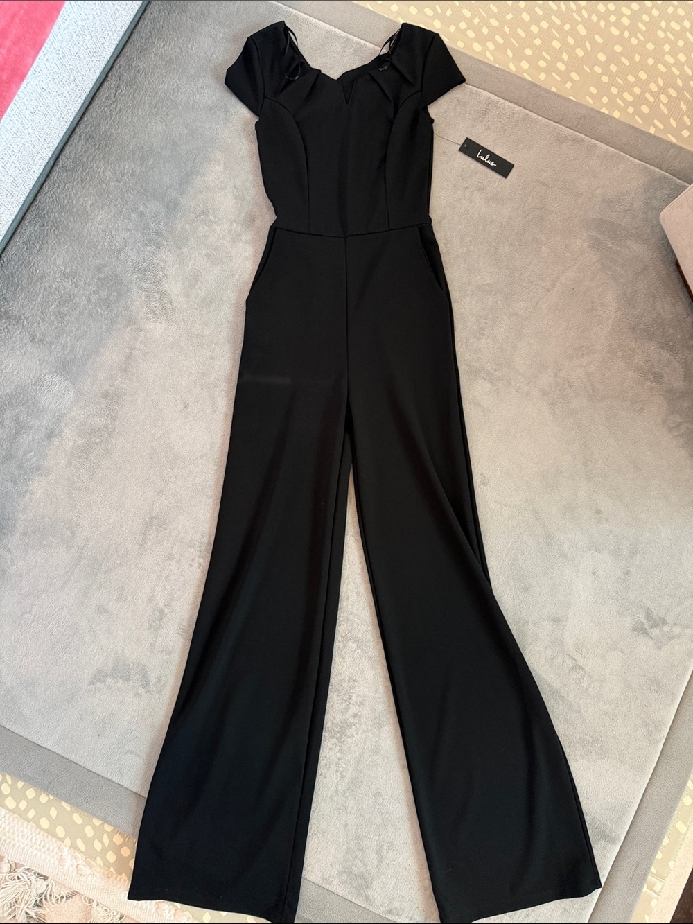 Lulu's Black Cap-Sleeve Wide-Leg Jumpsuit with Notched Neckline